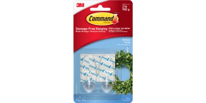 Ganchos Command transparentes para decorar sin herramientas.
